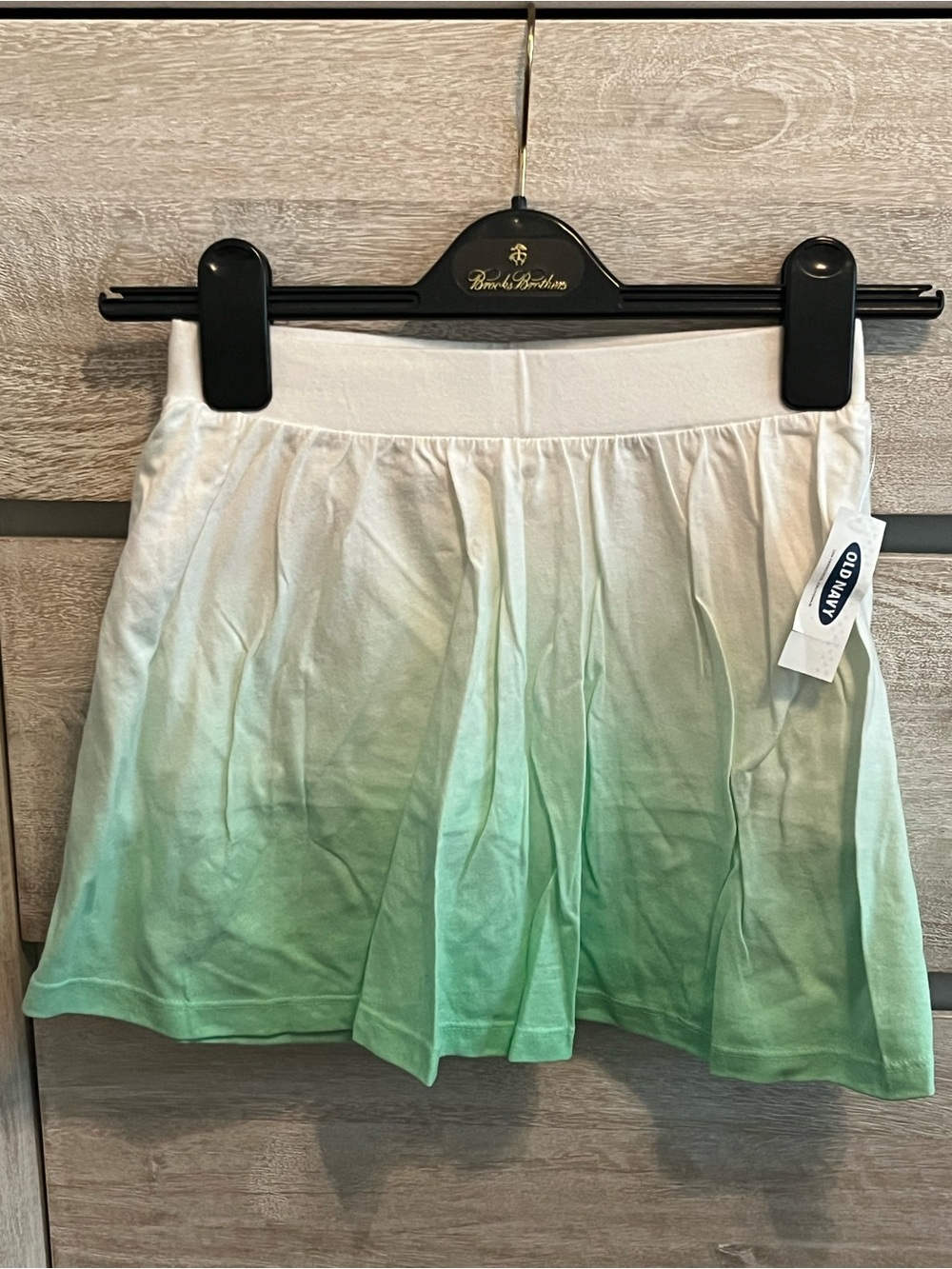 Old Navy Ombre Green Pleated Mini Skort has short pants under skirt(girl size M